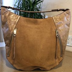 Gorgeous!!! Halston Heritage Tan Hobo Leather & Suede Handbag With Dust Bag Nwot! Tan Leather & Tan Suede. Dual Gold Zippers In Front. Both Are Fully Functional To Hold Things. Can Be Worn Zipped Close Or Zipped Open. See Detailed Pics Provided. Versatile Styling. Classic. Clean Simple Lines. Beautiful Halston Lining With 2 Interior Media Pockets & 1 Interior Zipper Compartment. Zip Closure. Beautiful Hardware And Detail In Stitching & Design Of This Gorgeous Hobo. Perfect Condition. I Bought Th Gold Leather Bucket Shoulder Bag, Brown Faux Leather Hobo Bag For On-the-go, Brown Textured Leather Hobo Bag With Double Handles, Gold Leather Bag For On-the-go, Brown Textured Leather Shoulder Bag For On-the-go, Light Brown Hobo Bag With Leather Handles For Shopping, Brown Crossbody Hobo Bag With Gold-tone Hardware, Travel Hobo Bag With Gold-tone Hardware In Faux Leather, Gold Leather Bucket Satchel