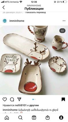 a group of dishes and cups with reindeer faces on them, all decorated in different designs