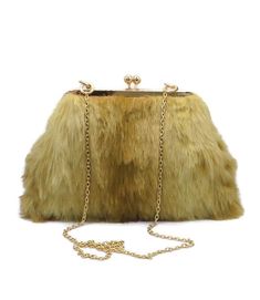 The ombre brown faux fur clutch bag is fully lined with a floral satin fabric  The luxury faux fur has a 25mm Pile  The clutch has interfacing added  Handmade lovely luxury evening bag with option of shoulder straps or handle available - either a gold coloured chain strap or an acrylic tortoiseshell handle or strap or an acrylic gold/cream handle . The length of the tortoiseshell strap is 110cm The length of the tortoiseshell handle is 40cm The length of the gold/cream handle is 40cm  The clutch Fur Clutch Bag, Glitter Clutch Bag, Gold Clutch Bag, Bridal Clutch Bag, Fur Clutch, Fur Purse, Fur Handbags, Upcycled Bag, Ombre Brown