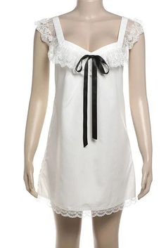 Embrace effortless charm with our Lace V-Neck Backless Bows Suspender Mini Dress. Featuring a flattering V-neckline and delicate spaghetti straps, this dress exudes a blend of elegance and allure. Details: Elasticity: Slight Stretch Fabric Type: POLYESTER Silhouette: STRAIGHT Neckline: V-Neck Material: POLYESTER Material: SPANDEX Size (IN) Bust Length S 34.65 33.07 M 36.22 33.86 L 37.80 34.65 White V-neck Slip Dress With Delicate Straps, Feminine V-neck Mini Dress With Delicate Straps, Elegant Lace Mini Dress With Straps, V-neck Mini Dress For Wedding Night In Spring, White V-neck Slip Dress With Adjustable Straps, Summer Slip Dress With Lace Trim And Sweetheart Neckline, Coquette Slip Dress For Spring Party, Coquette Summer Party Slip Dress, White Slip Dress With Delicate Straps And V-neck