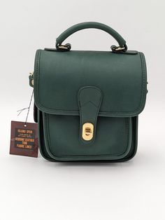 Vintage Emerald Green Leather Purse, Cross Body Bag- New w/ Tags. Classic Rectangular Box Bag For Errands, Green Double Handle Satchel With Mobile Phone Bag, Vintage Green Satchel With Double Handle, Green Top Handle Satchel With Phone Bag, Green Vintage Satchel With Double Handle, Classic Green Bag With Detachable Strap, Green Square Flap Bag For Everyday Use, Green Square Flap Bag For Everyday, Classic Top Handle Mobile Phone Bag