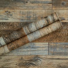 a wooden object is laying on the floor