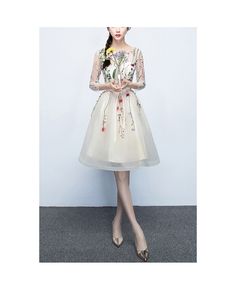 Get 10% off now! Buy floral champagne tulle party dress with sheer sleeves at cheap price online. Free stable shipping and pro custom service since 2009. Spring Banquet Tulle Skirt Dress, Spring Banquet Dress With Tulle Skirt, Spring Long Sleeve Organza Dresses, Long Sleeve Organza Dresses For Spring, Spring Organza Dress With Long Sleeves, Spring Banquet Dress With Sheer Bodice, Spring Evening Dress With Sheer Bodice In Organza, Spring Knee-length Tulle Evening Dress, Sheer Bodice Long Sleeve Evening Dress For Spring