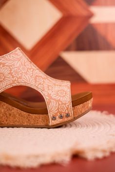 Maximize your potential in the nude colored Isabella Tooled Wedge Sandals! With a velcro closure for complete adjustability, enjoy all-day comfort and unstoppable confidence with every step. Fit: True to Size. If you wear a 1/2 size or have a wide width foot, size up a half size.Heel: 3" Brand: Very G Overall Skirt Denim, Wedge Heel Sneakers, Nude Wedges, Summer Denim, Active Wear Leggings, Sneaker Heels, Denim Top, Denim Shop, Wedge Heels