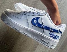 Hand-painted LA Dodgers custom AF1. Painted with water-resistant and non-cracking leather paint. Every shoe used is 100% authentic. Sizing details Air Force 1's run big, so we recommend that customers choose a half size down from their usual size. Custom Lace-up Leather Sneakers With Waterproof Paint, Waterproof Leather Custom Sneakers Lace-up, Casual Leather Custom Sneakers With Waterproofing, Custom Leather Sneakers With Waterproof Paint For Streetwear, Sporty Custom Leather Sneakers With Waterproof Paint, Hand Painted Lace-up Leather Custom Sneakers, Custom Leather Sneakers For Sports, Customizable Leather Sneakers For Sports, Customizable Leather Sneakers