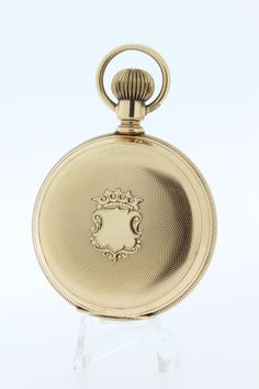 This wonderful Elgin pocket watch is made in 14 karat gold, has a blank dust cover, and a blank shield that can be engraved with initials or date. The measurements of the pocket watch is 53.88 millimeter (diameter) and sits 17.82 MM tall. C9275KLPPPG --Please reference our policy for more details-- For International orders, please provide a phone number for shipping purposes. Just place a note in the comment box during check out.Thank you.** Luxury Engraved Heirloom Pocket Watch, Victorian Yellow Gold Pocket Watch With Chronometer, Antique 14k Stamped Round Watches, Antique Medallion Self-winding Pocket Watch, Antique 14k Stamped Watches, Victorian Yellow Gold Pocket Watch For Anniversary, Antique Self-winding Medallion Pocket Watch, Antique Round Pocket Watch With Polished Finish, Antique Polished Pocket Watch