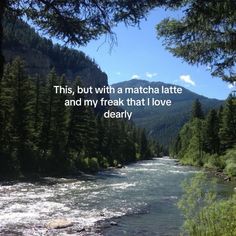 a river surrounded by trees with a quote on it