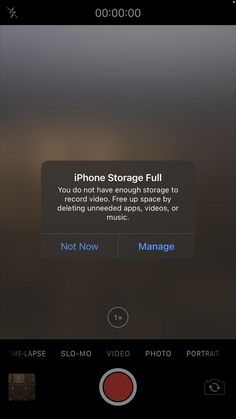 an iphone screen showing the settings for storage full and not now manage file size options