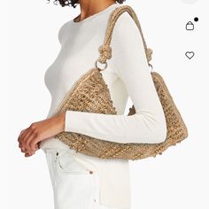 Cult Gaia's Hera Shoulder Bag Is A Standout Piece, Crafted Entirely From Raffia. This Design Features A Non-Adjustable Strap And A Zippered Closure, Providing A Secure Yet Stylish Option For Any Occasion. Shoulder Strap Interior: One Slip Pocket Top Zip Closure Raffia Size About 20"W X 10"L Shoulder Strap: About 11"L Chic Handheld Handwoven Shoulder Bag, Elegant Handwoven Jute Shoulder Bag, Elegant Everyday Jute Shoulder Bag, Cult Gaia Bag, Cult Gaia, Pocket Top, Gold Beads, Design Features, Adjustable Straps