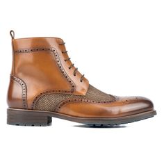 With a stylish two-tone herringbone pattern with a wool-like texture, The Flint tall boots are perfect for professional attire or casual wear. The mixed material construction ensures a comfortable fit, while the pull-tab makes it easier to get them on and off and the 5.5-inch shaft provides added protection and style Mens Dress Boots, Oxford Dress Shoes, Closed Toe Shoes, Dress Boots, Professional Attire, Shoe Carnival, Suede Sandals, Herringbone Pattern, Tall Boots