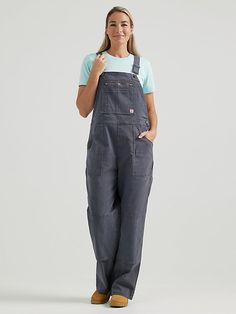 BUILT FOR ANYTHING For hard-working women on the move, the Women's Wrangler® RIGGS WORKWEAR® Relaxed Work Overall is the perfect companion. Combining fashion and function with rough and tumble craftsmanship, this relaxed-fit, loose leg cotton overall handles your toughest days with ease, with just enough stretch to always move with you. With adjustable straps and workwear favorite features, including a zippered chest pocket, zippered back thigh pocket, a utility thigh pocket, double-layered knee Cheap Utility Shortalls With Pockets, Cheap Workwear Overalls With Pockets, Cheap Women's Workwear Overalls, Cheap Shortalls With Pockets For Workwear, Cheap Dark Wash Overall Jumpsuit, Cheap Light Wash Overalls With Pockets, Cheap Utility Overalls With Side Pockets, Cheap Dark Wash Overalls Jumpsuit, Cheap Workwear Bottoms