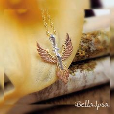 "This classy necklace is featured on 925 sterling silver chain plated in gold. The featured pendant is a beautiful Sterling Phoenix drop pendant, which is also 925 sterling silver plated in 18K rose gold and yellow gold. Stunning! As with all BellaIpsa back-closure necklaces, the lobster clasp is designed for both beauty and ease, utilizing an easy to grasp infinity (figure eight) 925 sterling clasp, accompanied by a sterling silver infinity link (perfect for adding a BellaIpsa back piece!). No Necklace Infinity, Phoenix Necklace, Classy Necklace, Phoenix Rising, Bird Pendant, Classy Jewelry, 925 Sterling Silver Chain, Pendant Gold, Drop Pendant