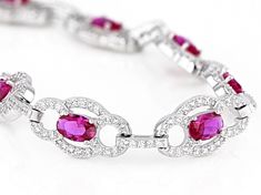 Bella Luce ® ruby and white diamond simulants 8.82ctw oval and round, rhodium over sterling silver tennis bracelet. Measures approximately 7.25" and 8"L x 0.38"W and has a hidden box closure. Oval Cubic Zirconia Tennis Bracelet In Fine Jewelry Style, Fine Jewelry Oval Cubic Zirconia Tennis Bracelet, Oval Cubic Zirconia Tennis Bracelet Fine Jewelry, Oval Cubic Zirconia Tennis Bracelet With Gemstones, Oval Gemstone Cubic Zirconia Tennis Bracelet, Silver Ruby Tennis Bracelet, Silver Ruby Gemstone Tennis Bracelet, Elegant Silver Tennis Bracelet With Ruby, Elegant Silver Ruby Tennis Bracelet