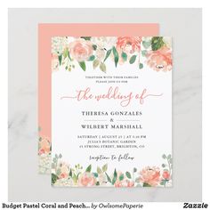 an elegant wedding card with pink flowers and greenery on the front, is shown