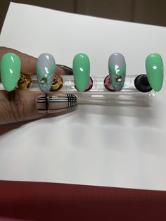 medium stiletto shaped press on nails with a mint green and a gem design.  All of our sets are made with Gel Nail Polish. These nails are reusable, if you take them off the Correct way. Care cards will be added with each purchase.  Each set will come with 10 press on nails, a mini file, cuticle pusher and stick pads.  sizes:  please choose the size you would like options range from XS-XL  for custom sizes please send a message or leave a note on order.  Custom sizes please reference our size car Stiletto Shaped Nails, Medium Stiletto, Gem Design, Shape Nails, Nails Medium, Cuticle Pusher, Nail Sizes, Hand Designs, Gel Nail