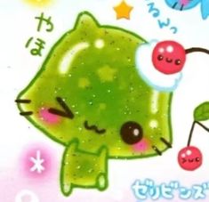 a green cat with a cherry on it's head and the words hello kitty written in japanese