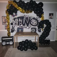 a party room with balloons and music equipment