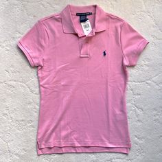 100% Cotton Slim Fit Polo By Ralph Lauren Classic Pink Short Sleeve Shirt, Fitted Ralph Lauren Pink Top, Fitted Pink Ralph Lauren Top, Pink Polo Collar Top For Summer, Pink Ralph Lauren Cotton Tops, Pink Ralph Lauren Shirt For Summer, Ralph Lauren Pink Shirt For Spring, Ralph Lauren Pink Summer Shirt, Ralph Lauren Pink Spring Shirt