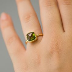 Cushion Cut Peridot Ring - Bezel Ring  - Gemstone Ring- Gold Ring - August Birthstone Ring -. $66.00, via Etsy. Green Solitaire Stackable Rings As Gift, Everyday Gemstone Ring For May Birthstone, Stackable Peridot Jewelry As Gift, Stackable Peridot Jewelry Gift, Minimalist Handmade Green Ring, Peridot Stackable Birthstone Ring As A Gift, Faceted May Birthstone Ring Jewelry, Faceted Stackable Rings As Fine Jewelry Gift, Faceted Stackable Rings Fine Jewelry Gift