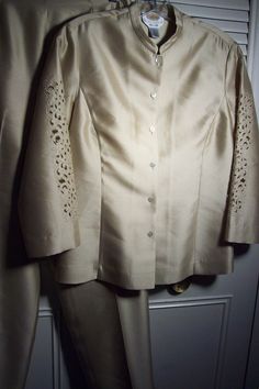 Elegant pure silk pantsuit, cream in color.  Talbot's dressy evening suit.  Bust measures 36", waist area 32", length 22".  Waist on pants 30", length 38 1/2".  Apparently never worn.  Stored with TLC.  Comes from a smoke-free home.  No flaws of any kind. Silk Pantsuit, Silk Pant Suit, Elegant Suit, Evening Suit, Evening Wedding, Womens Blazers, Pure Silk, Blazer Suit, Special Occasion