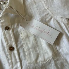 Well Dressed Wolf Short Sleeve Button Down Shirt Boys Size 4t Cream Colored With Beautiful Dainty Embroidered Details & Wooden Buttons 100% Cotton New With Tags, Excellent Condition Well Dressed Wolf, Wolf Shirt, Embroidered Details, Wooden Buttons, Size 4t, Well Dressed, Cream Color, Button Downs, Shirts Tops