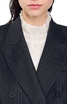 Slim-fit pinstriped suit jacket, featuring a stand-up collar, a double-breasted design with buttons, long sleeves and welt pockets.  This jacket matches the trousers ,  shorts  and  tie Sandro Women's suit jacket Fitted design Pinstriped Double-breasted button fastening Long sleeves SANDRO logo buttons Welt pockets on waist The model is 5'8 tall and wears a size 4 Elegant Pinstripe Outerwear With Button Closure, Pinstripe Blazer With Lapel Collar For Business Casual, Pinstripe Blazer With Double Button Closure For Office, Office Pinstripe Blazer With Double Button Closure, Pinstripe Notch Lapel Blazer For Office, Pinstripe Notch Lapel Blazer With Button Closure, Pinstripe Blazer With Notch Lapel And Button Closure, Pinstripe Blazer For Semi-formal Fall Occasions, Double-breasted Pinstripe Blazer For Work