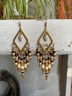 gold boho chandelier dangle earring set with wooden beads  handmade with luv <3 ꕥ message me for custom made jewelry! Boho Chandelier, Made Jewelry, Beads Handmade, Wooden Beads, Earring Set, Jewelry Earrings Dangle, Beading, Dangle Drop Earrings, Dangle Earrings