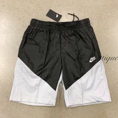 NWT Nike CT5617-010 Men Sportswear Windrunner Shorts Polyamide Black Grey Size S Details: 100% Authentic Style number: CT5617-010 Material: 100% Polyamide Color: Black grey Size: Small The breathable mesh lining An elastic waistband with drawstring offers an adjustable fit Open hand pockets Back zip pocket About 8" inseam Standard fit at knee length Please consider the size chart on picture #8 and #9 as a reference  Size approximately: waist 14" one side, 20.5" shorts length Retail: $55 + tax Ab Holiday Finds, Men Sportswear, Nylon Shorts, Open Hands, Active Wear Shorts, Basketball Shorts, Mens Sportswear, Grey Shorts, Black Grey