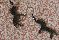 Antique brass tribal horse charms on antique brass French ear wires. Please see Shop Policies for additional shipping information. Horse Earrings, Rancho Cucamonga, May 20, Shop Policies, Ear Wires, Antique Brass, Beauty Book, Display Homes, Charms