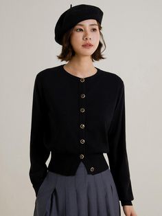 This is a feminine and romantic cardigan by LANGSON that is made out of high quality acrylic, polyester, nylon, and wool blend fabric. With design detail of minimal round neckline and high quality buttons on the front, it gives a trendy and feminine look.- Thick ribbed hem for feminine silhouette- Front button closure- Feminine and modern mood Elegant Fine Knit Outerwear In Solid Color, Elegant Button-up Winter Sweater, Elegant Button-up Fall Sweater, Elegant Winter Sweater With Button Closure, Elegant Button-up Sweater, Elegant Solid Color Button-up Sweater, Elegant Cardigan With Buttons, Elegant Long Sleeve Cardigan With Buttons, Chic Crew Neck Cardigan With Buttons