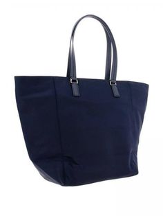 Tory Burch Women's Tilda Nylon Tote Bag Tory Navy 51326 405 Tory Burch Tilda tote crafted in durable, lightweight nylon with gold-tone fittings This tote features 1 main compartment, 1 wall zip pocket, zip-top closure, and 2 leather handles with a 9.56" drop H: 14.34" x L: 20.72" x D: 7.77" Daily Nylon Bags With Leather Handles, Daily Use Nylon Bags With Leather Handles, Nylon Bags With Leather Handles For Daily Use, Travel Bags With Nylon Handles, Casual Nylon Bags With Leather Handles, Nylon Shoulder Bag For Shopping, Nylon Bags With Handles For Daily Use, Functional Nylon Bags With Leather Handles, Everyday Nylon Shoulder Bag With Handles