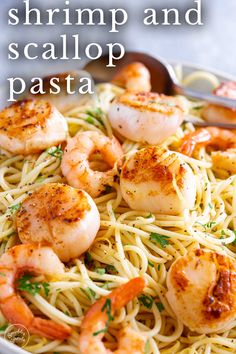 shrimp and scallop pasta in a white bowl