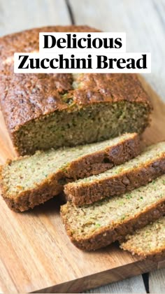 sliced loaf of delicious zucchini bread on a wooden cutting board with text overlay