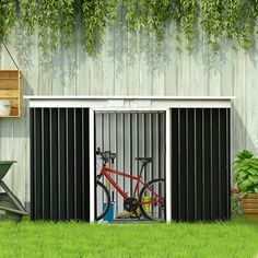 a bicycle is locked to the side of a building with vertical blinds on it's sides