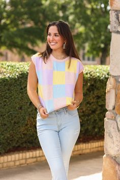 Our "Erin Colorblock Top (Pink Multi)" is a colorblocked sweater vest top with pastel colors. Our model is wearing a size Small. Casual Patchwork Sleeveless Sweater Vest, Trendy Pink Sweater Vest For Spring, Spring Multicolor Color Block Tank Top, Casual Multicolor Color Block Tank Top, Playful Color Block Tops For Spring, Trendy Spring Tops With Color Matching, Multicolor Patchwork Casual Tank Top, Casual Multicolor Patchwork Tank Top, Pink Cotton Casual Sweater Vest