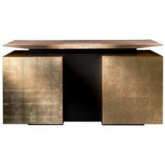 a gold and black sideboard with two doors on the front, one door open