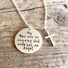 "This simple necklace is the perfect way to remember a loved one no longer with us. 1-inch aluminum pendant comes hand stamped with the phrase \"My Mom was so amazing God made her an Angel\" and a silver cross. You can also change the phrase to say Dad or Brother or Sister, etc. My items are hand stamped by me, making them a unique gift. Each letter is stamped individually and may not line up exactly adding to the charm and uniqueness of the gift. Note: It is not possible to stamp both sides of Inspirational Personalized Silver Charm Necklace, Personalized Inspirational Silver Charm Necklace, Personalized Inspirational Silver Charm Necklaces, Silver Hand Stamped Meaningful Charm Necklace, Inspirational Nickel-free Charm Necklace For Mother's Day, Spiritual Hand Stamped Necklaces For Personalized Gift, Personalized Hand Stamped Charm Necklaces, Meaningful Hand Stamped Charm Necklace For Mother's Day, Inspirational Silver Necklace For Father's Day