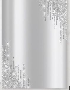 a silver shower curtain with white glitter on it