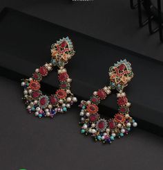 Feel special and look special by wearing these beautiful Earrings Elegant Multicolor Pearl Earrings For Celebration, Multicolor Drop Pearl Earrings For Wedding, Elegant Multicolor Dangle Chandbalis, Elegant Multicolor Chandbali Chandelier Earrings, Elegant Multicolor Chandbali Bridal Earrings, Elegant Multicolor Chandbalis For Celebrations, Elegant Jeweled Multicolor Danglers, Elegant Multicolor Jeweled Danglers, Elegant Multicolor Chandbali Earrings