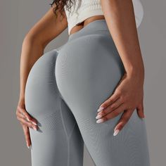 Get ready to elevate your activewear game with our Grey Scrunch Leggings! Designed for both style and performance, these leggings are a must-have for every fashion-forward fitness enthusiast. The scrunch detailing on the back accentuates your curves, giving you that perfect blend of sass and support. ✔️High-stretch fabric✔️Raised contouring to accentuate your waist and to define the lower glutes✔️Super soft & lightweight seamless fabric✔️Reinforced scrunch bum stretch stitch✔️Seamless Compressive Seamless Gym Pants, Squat Proof Athleisure Leggings For Gym, Stretch Squat Proof Gym Tights, Squat Proof Stretch Gym Tights, Sporty Seamless Pants For Gym, Compression Seamless Gym Tights, High Stretch Moisture-wicking Tights For Gym, Sporty Seamless Gym Pants, Squat Proof Stretch Leggings For Gym