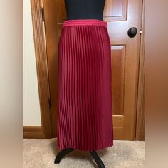 A New Day Pleated Maxi Skirt, Size S. Never Worn. Lot 1. Red Pleated Relaxed Maxi Skirt, Red Pleated Long Skirt, Chic Red Long Pleated Skirt, Red Midi Pleated Skirt, Red Pleated Bottoms, Chic Red Pleated Midi Skirt, Red Long Pleated Skirt For Spring, Red Pleated Midi Skirt For Spring, Red Pleated Skirt With Relaxed Fit For Party