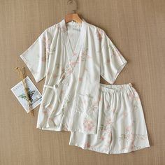 The Printed Kimono Shorts Set Best Affordable Pajamas set features short sleeve kimono top with classic printed kimono shirt, which is a cotton shirt with floral print and laces and a shorts!! We are passionate about fabric and textile materials and have thus created the best, most comfortable yet practical line of pajamas. This loungewear is all you need to help relax at home. They are soft and easy to touch which projects versatility and effortless grace in every step you take. Made to make yo Ladies Pajamas, Kimono Pajamas, Short Sleeve Kimono, Kimono Dressing Gown, Printed Kimono, Kimono Shirt, Pink Kimono, Pajama Suit, Pink Pajamas