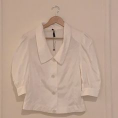 White Button Down With Should Pad Detail And Lapel. Never Worn! Puff Sleeve Blouse With Button Closure For Day Out, Collared Blouse With Button Closure For Day Out, White Collar Blouse For Day Out, Blouse With Button Closure And Collar For Day Out, Collar Blouse With Button Closure For Day Out, White Collared Blouse For Day Out, Fitted Collar Blouse For Day Out, Fitted Blouse With Collar For Day Out, White Collared Blouse With Back Button Closure