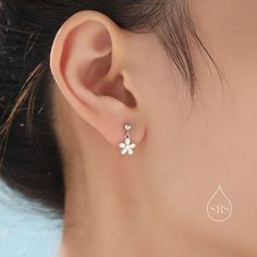 A dainty pair of earrings featuring a cute flower design.  Sold as a pair.  Complete with sterling silver butterfly backs.  Dimensions : 8mm flower. Materials and Care: These are made of sterling silver, they have been partially coated with 18ct gold plating. Only precious metals are used and they are hypoallergenic. Please keep in a sealed plastic bag when not wearing.  Packaging: All our jewellery comes with our branded velvet bag so your item is ready to be gifted.    Production Method: Small Batch lost wax casting.  ------------------------------------------------------------------- ★Free Shipping for UK orders. International orders with a flat postage fee. All our items are ready to ship within 48 hours. Orders arrive within 5 working days for UK orders and international delivery time Hypoallergenic Flower Dangle Earrings For Anniversary, Delicate Pierced Flower Drop Earrings, Delicate Hypoallergenic Flower Earrings, Dainty Hypoallergenic Flower Drop Earrings, Hypoallergenic Dangle Flower Earrings For Anniversary, Hypoallergenic Flower Drop Earrings For Anniversary, Dainty Dangle Flower Earrings For Anniversary, Dainty White Pierced Flower Earrings, Dainty Flower Charm Earrings For Anniversary