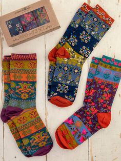 Our Boho Sock Set in our plum floral prints will brighten up any outfit in a playful and boho-colorful way. Wear these comfy socks with your favorite shoes while you're running errands, grabbing a coffee, or just hanging around the house! They’re not too loose or too tight -- they fit just right! These socks come in a set of three and are the perfect gift for anyone on your list. Plus, this adorable sock set is already packed in a box for easy gift giving! Boho Socks, Hippie Gifts, Colorful Website, Colorful Sneakers, Comfy Socks, Fun Socks, Cute Gift Boxes, Cozy Socks, Cozy Throw Blanket