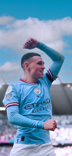 a soccer player is celebrating his team's victory