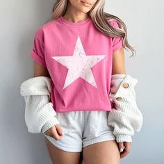 Loving this! Star Shirt Oversized Comfort Colors Tee with a Preppy Aesthetic Tshirt.  The perfect Indie Gift for Her and Fun in the Sun Star Tshirt! Great Gift Idea for a Preppy Girl with this Cute Beach Coverup.  Fun in the Sun!  𝐏𝐑𝐎𝐃𝐔𝐂𝐓 𝐃𝐄𝐓𝐀𝐈𝐋𝐒 🌸Comfort Colors 1717 Tee 🌸100% ring-spun US cotton. 🌸Medium fabric (6.1 oz/yd² (206.8 g/m  🌸Relaxed fit. Please check size chart. 🌸Pre-shrunk fabric.   🌸Signature sewn-in twill label. 🌸Double-needle stitching throughout.  No side se Casual Short Sleeve T-shirt With Star Logo, Summer Cotton T-shirt With Star Patch, Trendy Summer T-shirt With Star Patch, Crew Neck Tops With Star Logo For Summer, Cute Short Sleeve T-shirt With Star Print, Summer Crew Neck T-shirt With Star Print, Trendy Star Print Summer Tops, Cotton T-shirt With Star Print For Summer, Trendy Star Print Tops For Summer