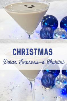 a martini glass sitting on top of a table with blue ornaments around it and the words christmas polar express - o'martini