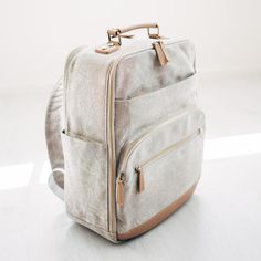 Our Lyra Camera Backpack is one of the most stylish and best camera bags for women. It's also great as a Laptop Bag, Weekender Bag and Diaper Bag. Beige Backpack For On-the-go, Versatile Travel Diaper Backpack, Versatile Travel Diaper Bag Backpack, Versatile Standard Backpack Diaper Bag For Travel, Versatile Diaper Bag Backpack For Travel, Travel Diaper Bag With Zipper Pocket, Travel Diaper Bag Backpack With Adjustable Strap, Travel Diaper Bag With Adjustable Strap, Travel Bag With Adjustable Strap