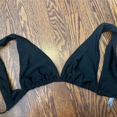 Never Worn, Perfect Condition Fits True To Size No Padding Black T-back Swimwear With Built-in Bra, Black T-back Halter Top For Poolside, Chic Black Halter Neck Swimwear, Beachwear Triangle Halter Top For Night Out, Summer Black T-back Swimwear, Black Backless Swimwear With Built-in Bra, Chic Black Halter Top For Pool, Black Summer Party Swimwear, Black Triangle Top Swimwear For Vacation